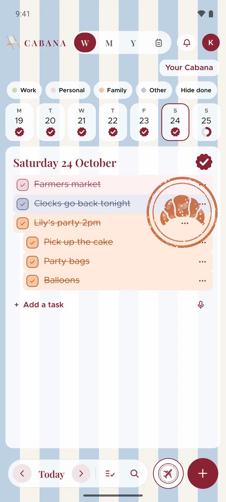 A finished Saturday in Cabana on an Android phone: every task on it ticked off and struck through, and its stamp, a croissant in a scalloped ring, printed over the corner of the day.